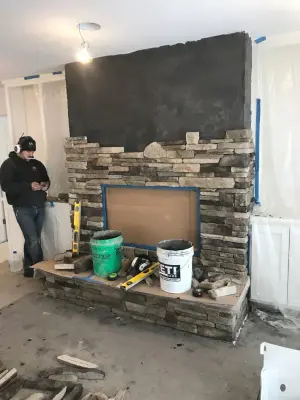 Stone Hearth Fireplace — Stone & Concrete Installation project by Martell Custom Stone LLC