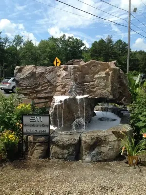 Opulent Waterfall Creations — Stone & Concrete Installation project by Marula Landscape & Design