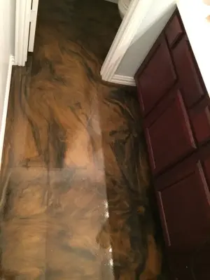 Epoxy Coated Metallic Bathroom Flooring — Stone & Concrete Installation project by Versatile Coatings LLC