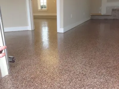 Epoxy Coated Metallic Basement Flooring — Stone & Concrete Installation project by Best Tech Coatings