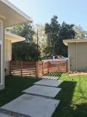 Redwood Fence with Mid Century Slats — Stone & Concrete Installation project by Swan General Homestead