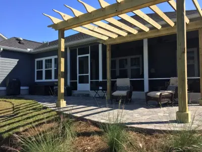 Lush Oak Terrace — Stone & Concrete Installation project by NeSmith Landscapes