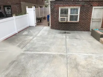 Fresh Concrete Driveway — Stone & Concrete Installation project by First Responders Construction, Inc.