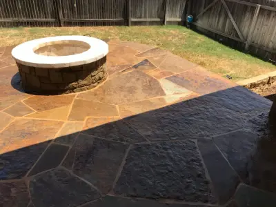 Patio expansion and fire pit addition — Stone & Concrete Installation project by Esposito Hardscapes, LLC