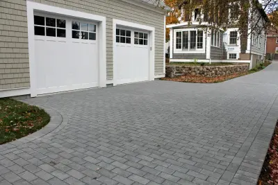 2014 Unilock Best Permeable Paver Driveway Award Winner - Newton, MA — Stone & Concrete Installation project by Premier Pavers & Hardscape Co