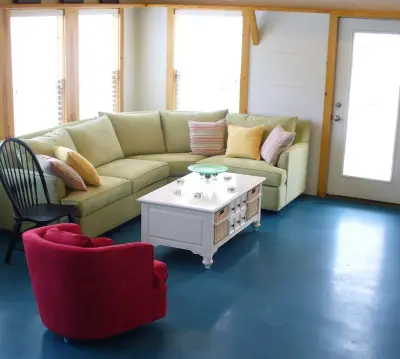 Concrete Stained Flooring in Kitchen and Living Area by Reycon Inc.