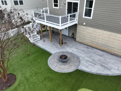 Modern Paver Patio with Artificial Turf and Putting Green — Landscape Construction project by The Outdoor Living Company in Arlington