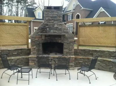 external fire pits — Stone & Concrete Installation project by Backyard Outfitters