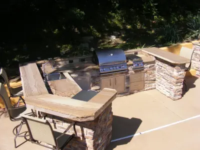 Alfresco Cooking Area and Fire Feature — Stone & Concrete Installation project by Semco Stone