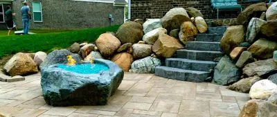 Outdoor Seating and Stone Barriers — Stone & Concrete Installation project by Denali Exterior Design