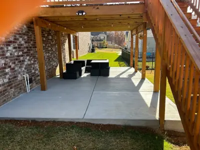 Under-Deck Patio — Stone & Concrete Installation project by The Concrete Gentlemen, LLC