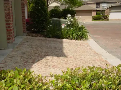 Paved Driveway and Walkway — Stone & Concrete Installation project by Brick Restoration