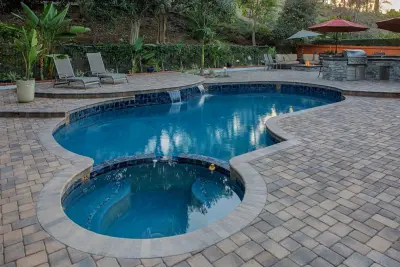 Pool Deck Paving Installation — Stone & Concrete Installation project by Pavescapesinc