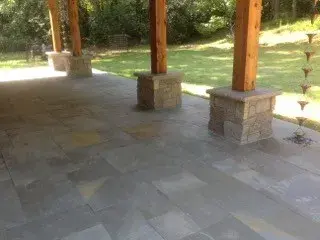 Bluestone Patio with Columns in Pennsylvania — Stone & Concrete Installation project by Harpeth Valley Hardscapes, LLC