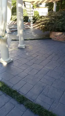 Renovated Pool Deck and Patio — Stone & Concrete Installation project by Artistic Hardscapes