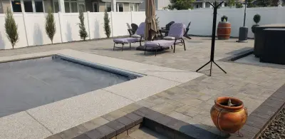 Pool patio — Stone & Concrete Installation project by Mountain Hardscape Systems