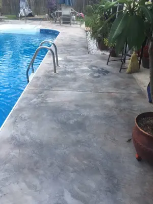 Swimming Pool Deck Design — Stone & Concrete Installation project by Concrete Magic Designs, LLC