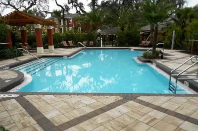 Orlando Florida Pool Deck Renovation - Paver Decks — Stone & Concrete Installation project by StoneCraft Pavers, LLC