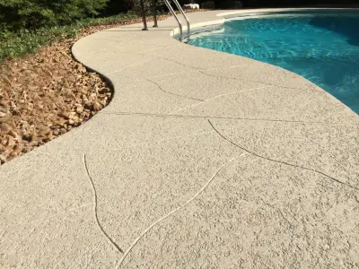 Deck Scoreline for Pool — Stone & Concrete Installation project by Decorative Concrete Resurfacing