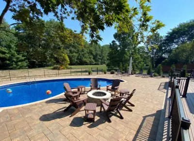 Summer Splash Pool Project — Stone & Concrete Installation project by Land Creations Landscaping Inc.