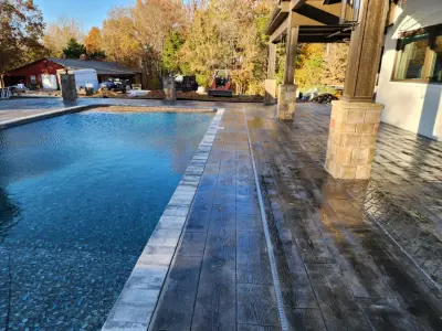 Patio Expansion for Pool Area — Stone & Concrete Installation project by The Concrete Gentlemen, LLC
