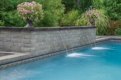 Patio Pool and Water Feature — Stone & Concrete Installation project by Cambridge Pavingstones With ArmorTec