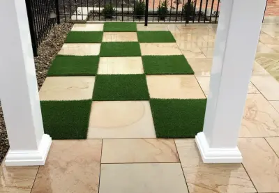 Checkerboard Turf Pool Project with Stone Patio — Stone & Concrete Installation project by Land Creations Landscaping Inc.