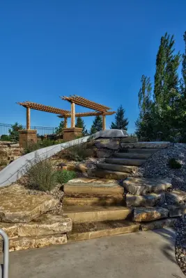 Blair's Poolside Enjoyment — Stone & Concrete Installation project by Watkins Concrete Block Company, Inc.
