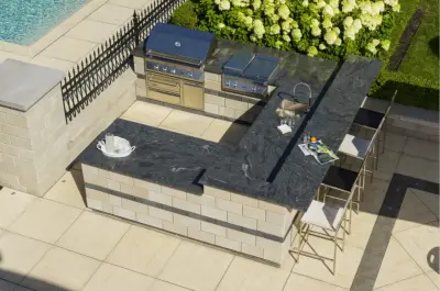 Blainville Poolside Patio — Stone & Concrete Installation project by Techo-Bloc