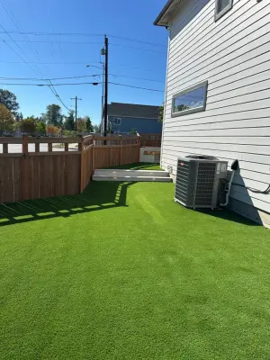 Ceramic tiles and synthetic grass — Stone & Concrete Installation project by Xavier Pavers