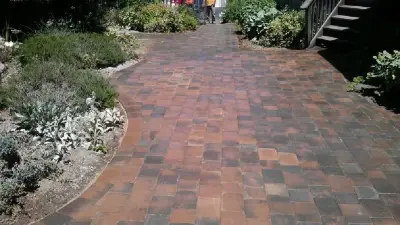 Personalized Brick Driveway by Rusling Paving & Concrete