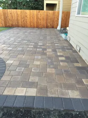 Patio Construction with Elevated Fire Pit — Stone & Concrete Installation project by Xavier Pavers