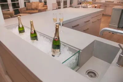 Home Concrete Bar with Built-in Champagne Trough and Sink — Stone & Concrete Installation project by Thiel Studios