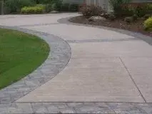 Textured and Tinted Driveways — Stone & Concrete Installation project by Albano's Concrete