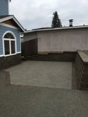 Wall and Patio Retention — Stone & Concrete Installation project by Xavier Pavers