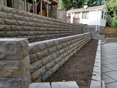 Wall Retention Solutions — Stone & Concrete Installation project by Custom Pavers & Design
