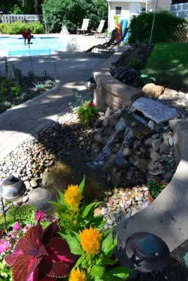 Rosemount garden revitalized — Stone & Concrete Installation project by Devine Design Hardscapes