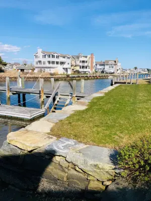 Geogrid Reinforced Seawall — Stone & Concrete Installation project by Hefel Masonry LLC