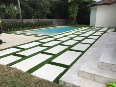 Baptist area backyard pool area — Landscape Construction project by Tropical Turf