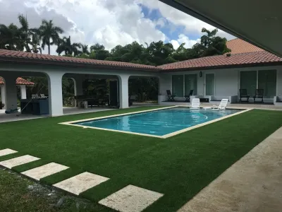 Galloway pool area — Landscape Construction project by Tropical Turf