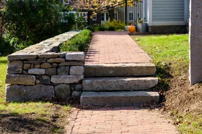Melrose- Historic home front wall, steps & brick path — Landscape Construction project by Village Stonesmith Gardens & Masonry in Melrose