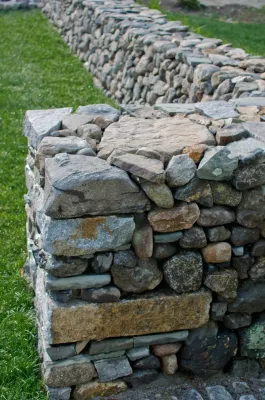 Dry laid stone wall & pillars — Landscape Construction project by Village Stonesmith Gardens & Masonry