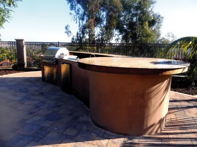 Outdoor Living Space with Kitchen and BBQ — Landscape Construction project by Ocean Blue Pools And Landscaping