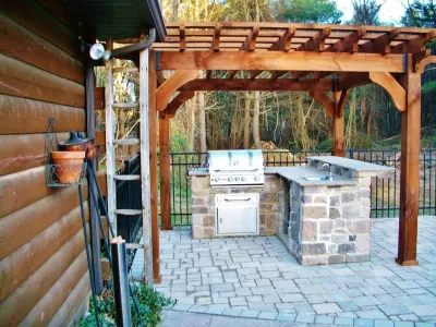 Pool Side Fireplace — Landscape Construction project by Weavers Landscape Company