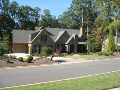 A Riverclub Country Club French Country Home by Southeast Studios Inc.