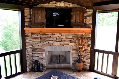Screened In Porch with Outdoor Living Space — Landscape Construction project by Willow Branch Landscapes