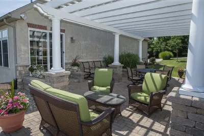 Classy Pergola with Paver Patio — Landscape Construction project by Winland's Complete Landscaping Service