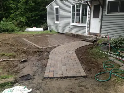 Plainfield, NH Small Patio and Walkway — Stone & Concrete Installation project by Maple Creek Landworks LLC