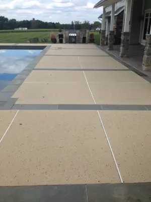 Textured Spray Coatings for Pool Decks — Stone & Concrete Installation project by Elite Concrete Design