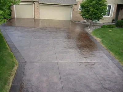 Decorative and Colored Stamped Concrete Driveways — Stone & Concrete Installation project by Cipala Decorative Concrete Inc